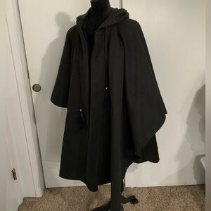 Never worn with tags size medium pancho
